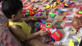 3 years Kid playing with toys