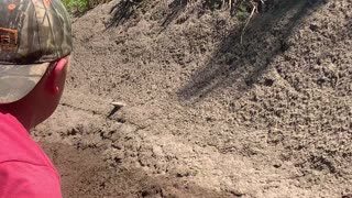 Grandson Finds Ancient Native American Axe in River Bank