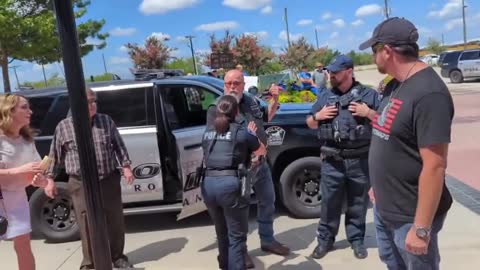 Protesters clash as armed volunteers 'protect' Texas drag event