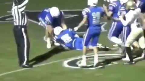 Boy with cerebral palsy runs a touchdown