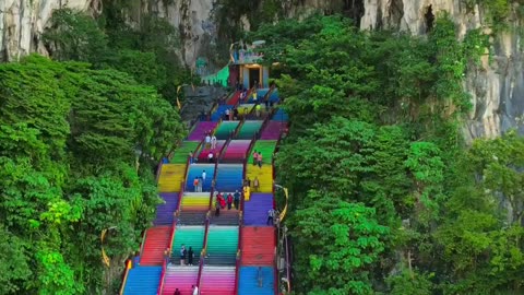 BATU CAVES IS A GIANT CAVE COMPLEX IN MALAYSIA DEDICATED TO HINDU SHRINES