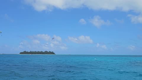 Saipan Managaha Island and clear sky parasailing