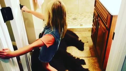 Massive Newfoundland completely blocks bathroom entrance