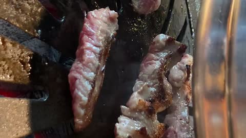 Beef grilling sound and turning video