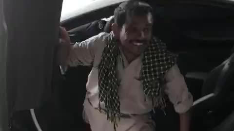 Indian dude smashes fingers in car door.