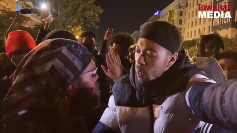 DISGUSTING: Anti-Trump Protester Stops Man From Waving American Flag