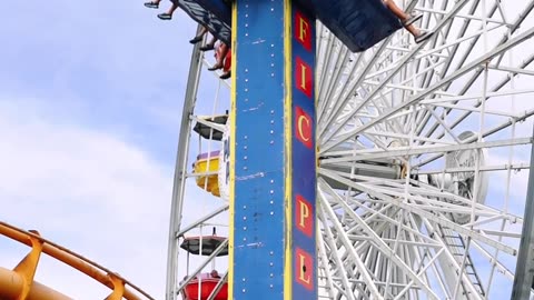 A Free Fall Amusement Ride In An Amusement Park