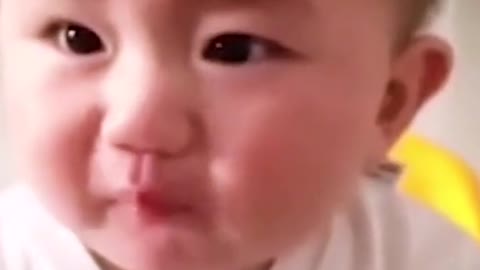 Baby's funny reaction first time testing lemon