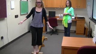 Concussion Therapy Using A Balance Beam