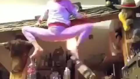 A GIRL FALLING FROM BOTTLS