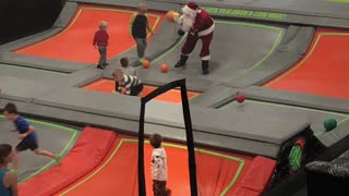 Santa playing with the kids