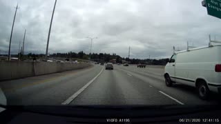 van loses ladder on freeway