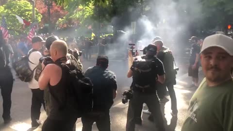 june 30 2018 Portland 1.0 Antifa throwing firecrackers at Patriot Prayer and Proud Boys