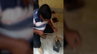 Chilling moment deadly cobra takes refuge in a home speaker