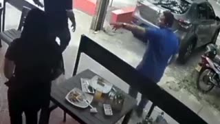 When robbers in Colombia disturbed an armed man enjoying his lunch, this was the end result.