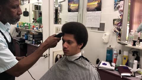 Cecil Hair Stylist for SHAFT Cuts my Son Jordans Fro!!