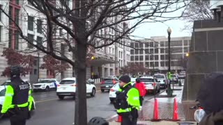 Man ranting in front of courthouse.