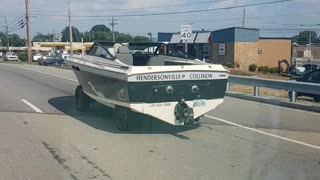 Man Drives His Boat Down The Road Like A Car