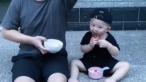 Funny cute son with his funny dad