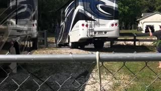 Backing in the RV into a tight spot with a canal in front