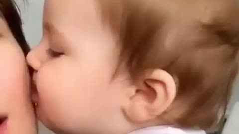 Baby kissing