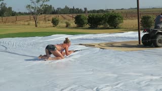 Bikini Babes Wipe Out On Slip N' Slide