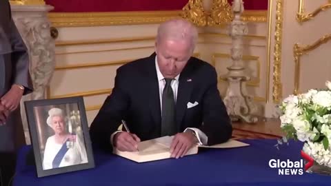 Queen Elizabeth death: "Hearts go out to the Royal Family,” Biden says signing book of condolences