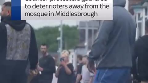 Anti-racist activists chase far-right protesters away from a mosque in Middlesbrough