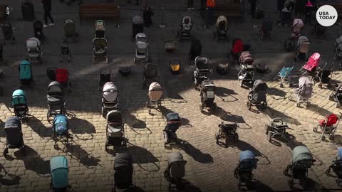 Empty strollers honor 109 killed children in Ukraine