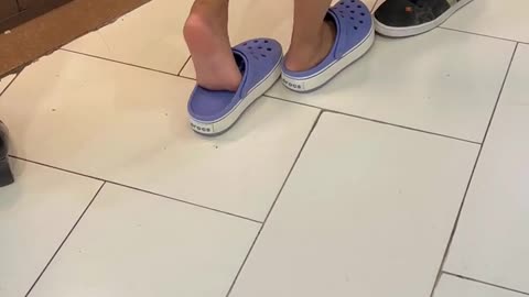 Standing Shoeplay At Restaurant