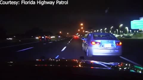WATCH Florida Woman Go Airborne In Wild Police Pursuit, Crash Into Car Dealership