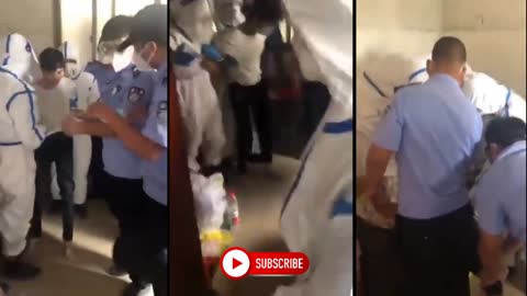 Chinese police caught on camera making Citizens wear Masks Forcefully