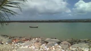 Beach, rocks, fishing boat, sky and clouds, filming the calm sea [Nature & Animals]
