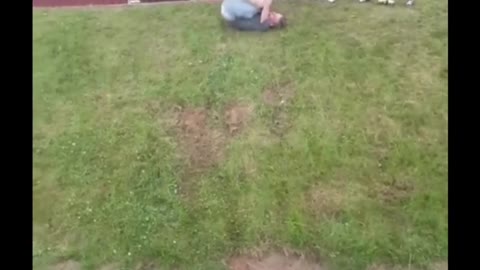 Drunk man rolls down a hill