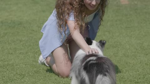 Woman Training Her Dog