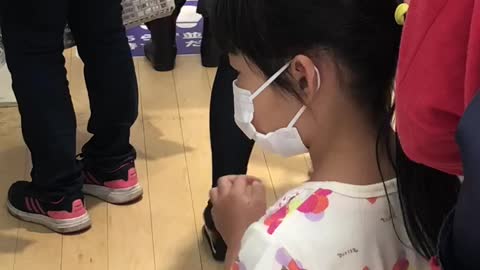 Japanese girl shopping with mom