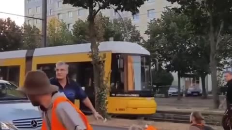 European pepper sprays mentally ill climate protestors blocking traffic.