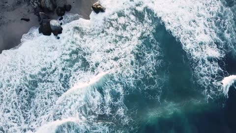 Drone View Of Big Waves Rushing To The Shore