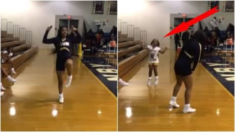 Check Out This Priceless Moment When A Little Girl Joins In On Big Sister's Cheer Solo