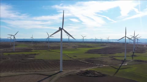 wind turbines in fields rural landscape spain environment green energy aerial