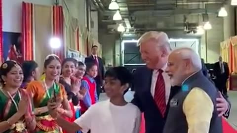 Donald Trump and Narendra Modi interracting with youngsters at a Event