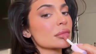 Kylie Jenner flaunts her famous pout while promoting her makeup