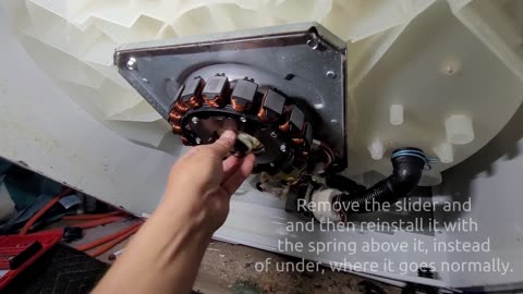 Easy way to lock the Whirlpool direct drive washer wash plate for removal.