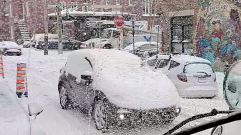 Car Completely Covered in Snow Goes for a Drive