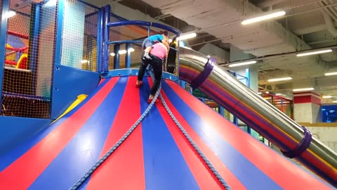 Kids pretend to play at the indoor playground for kids. family fun video & kids friendly games.