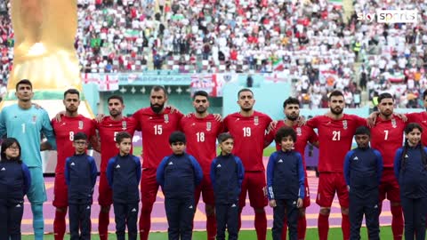 Iran players remain silent during their national anthem at the World Cup