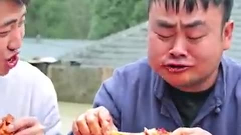 Hot chilli eating between brothers