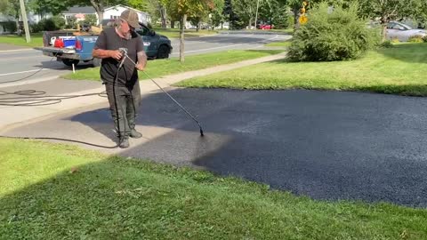 Professional Asphalt Spray Sealing: “The Backstep Moss One” Top Coats Pavement Maintenance