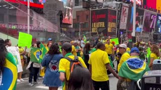 Protesters gather in Times Square chant “BRAZIL WAS STOLEN”