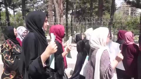Afghan women protest against headscarf decree